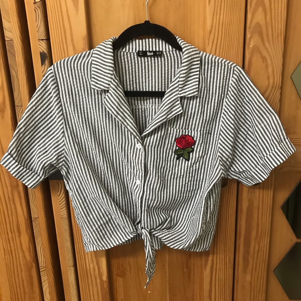 Grey and white collard shirt with rose on pocket
